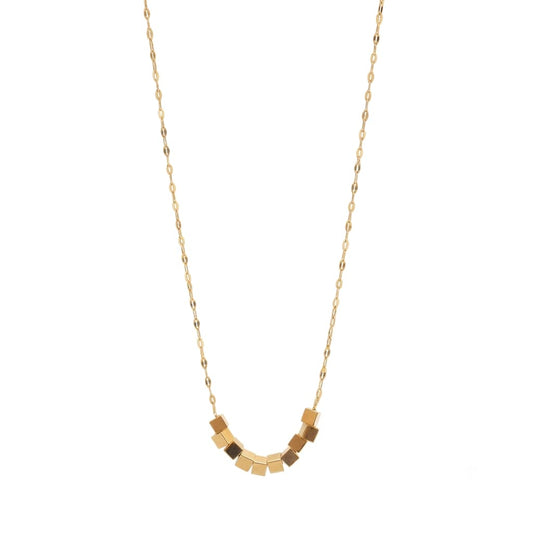 Gold necklace with geometric pendants on a white background