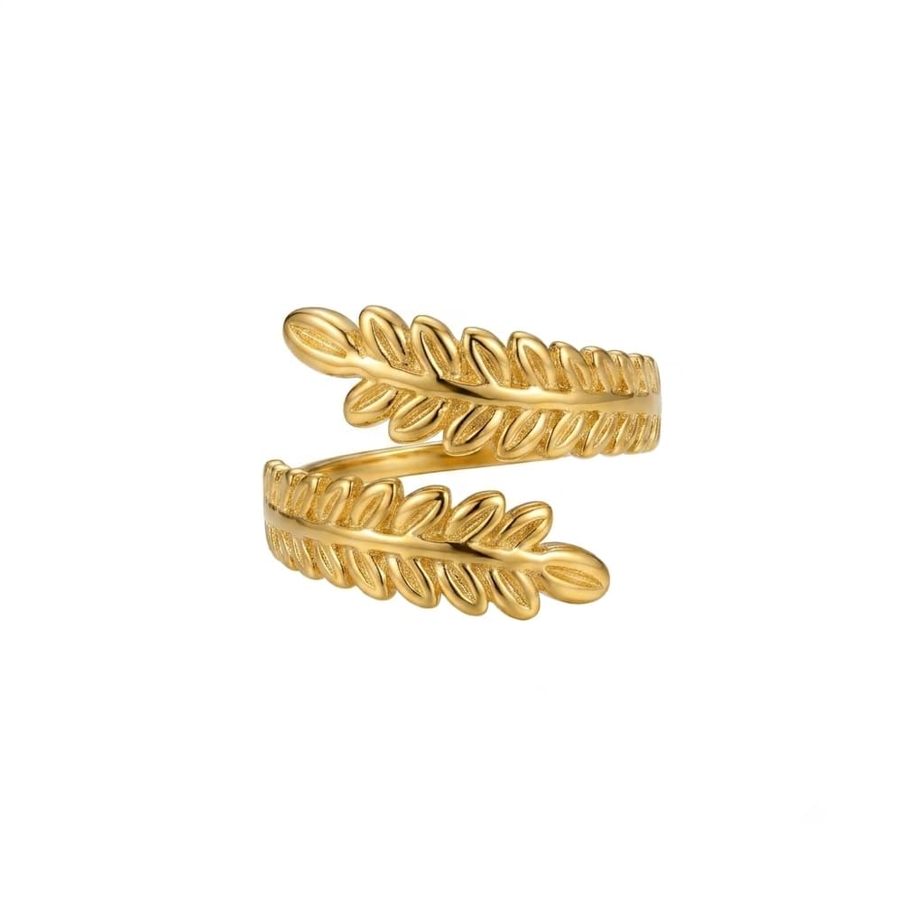 Gold leaf-shaped ring on a white background