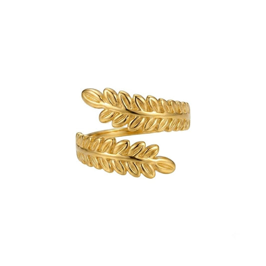 Gold leaf-shaped ring on a white background