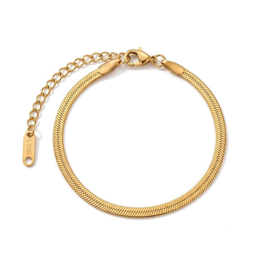 liquid gold stainless steel bracelet on white background