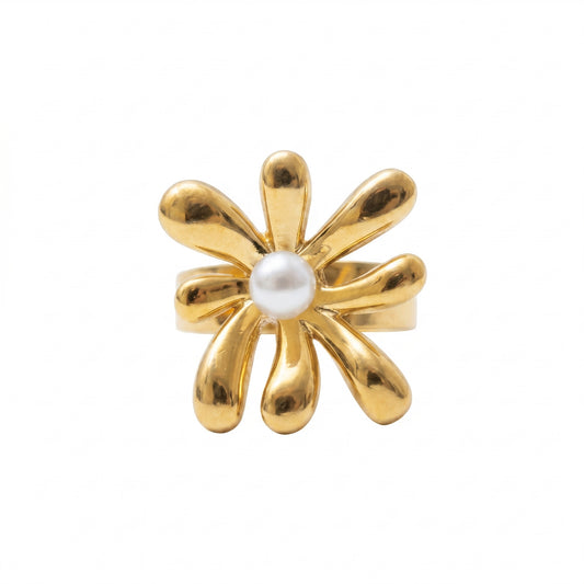 Gold flower-shaped earring with a pearl center on a white background
